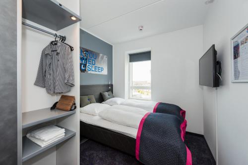 Habitación Doble Commodore del hotel Cabinn Copenhagen. Foto 2