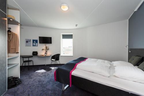 Habitación Captain - Cama doble del hotel Cabinn Copenhagen. Foto 1