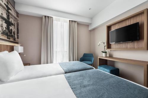 Habitación Doble - 1 o 2 camas del hotel Exe Saldanha. Foto 11