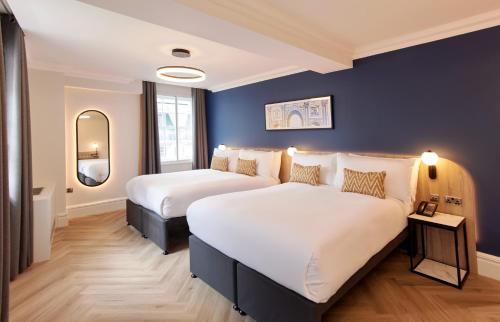 Habitación Familiar Deluxe del hotel Thistle London Park Lane. Foto 2