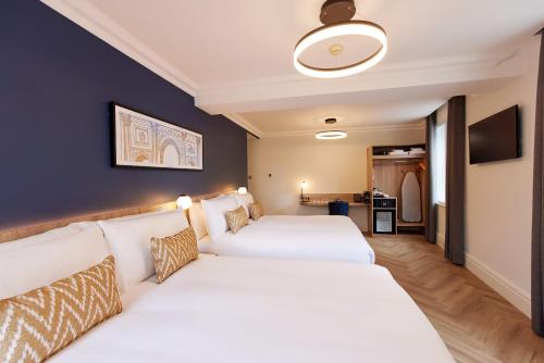 Habitación Familiar Deluxe del hotel Thistle London Park Lane. Foto 3