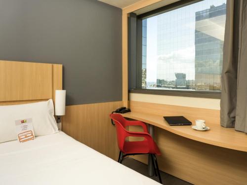 Habitación Doble Estándar del hotel Ibis Rio Porto Atlantico. Foto 1