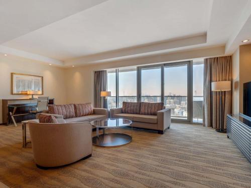 One - Bedroom Premium Apartment with Burj Khalifa and Creek View del hotel Swissotel Living Al Ghurair. Foto 1