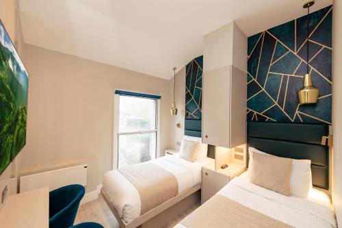 Estudio Familiar con 2 dormitorios independientes del hotel NOX HOTELS - Kensington