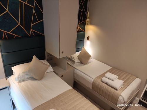 Estudio Familiar con 2 dormitorios independientes del hotel NOX HOTELS - Kensington. Foto 8