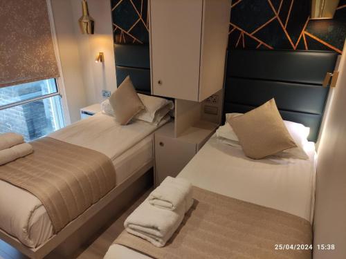 Estudio Familiar con 2 dormitorios independientes del hotel NOX HOTELS - Kensington. Foto 9