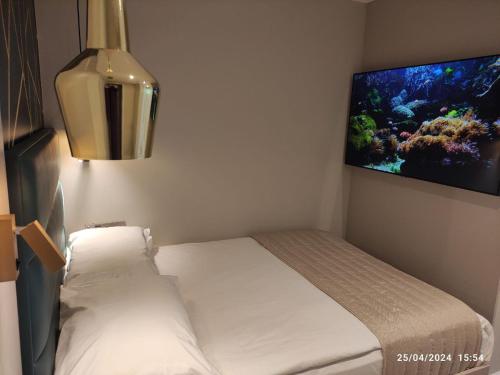 Estudio Familiar con 2 dormitorios independientes del hotel NOX HOTELS - Kensington. Foto 12