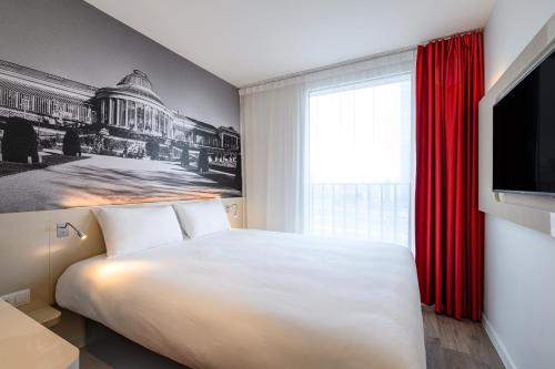Habitación Doble del hotel B and B Brussels Centre Gare du Midi. Foto 1