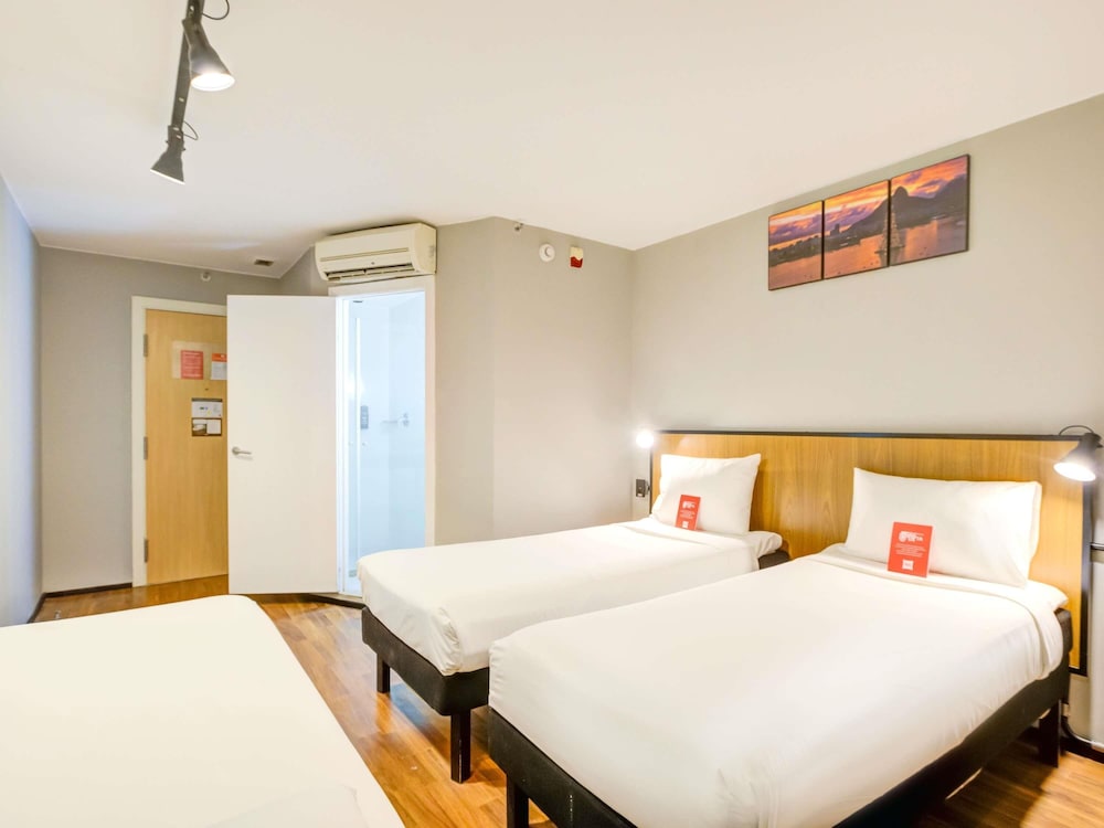 Apartamento Standard con 3 camas individuales del hotel Ibis Copacabana Posto 2. Foto 3