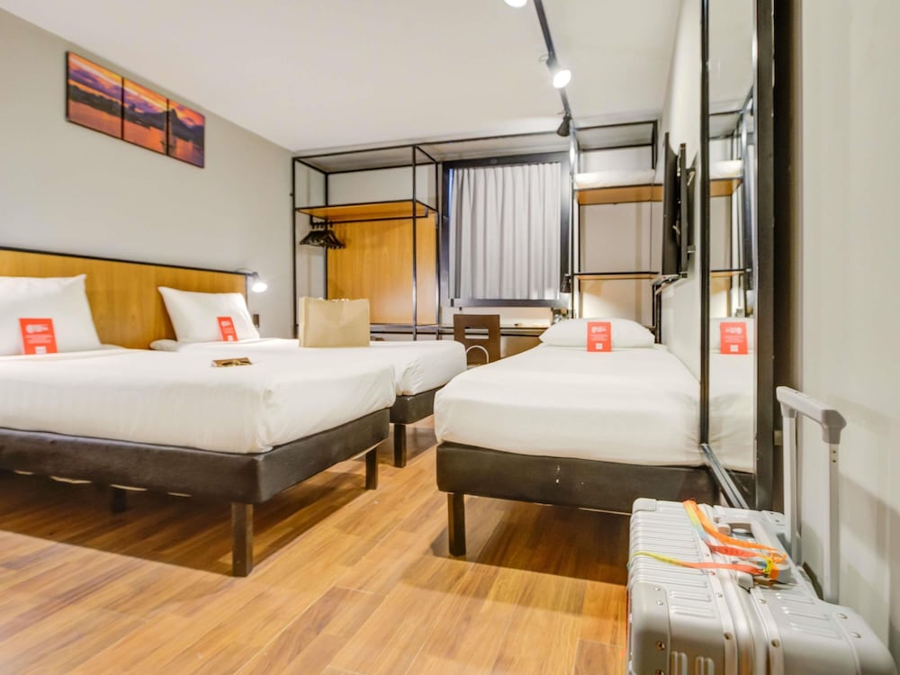 Apartamento Standard con 3 camas individuales del hotel Ibis Copacabana Posto 2. Foto 7