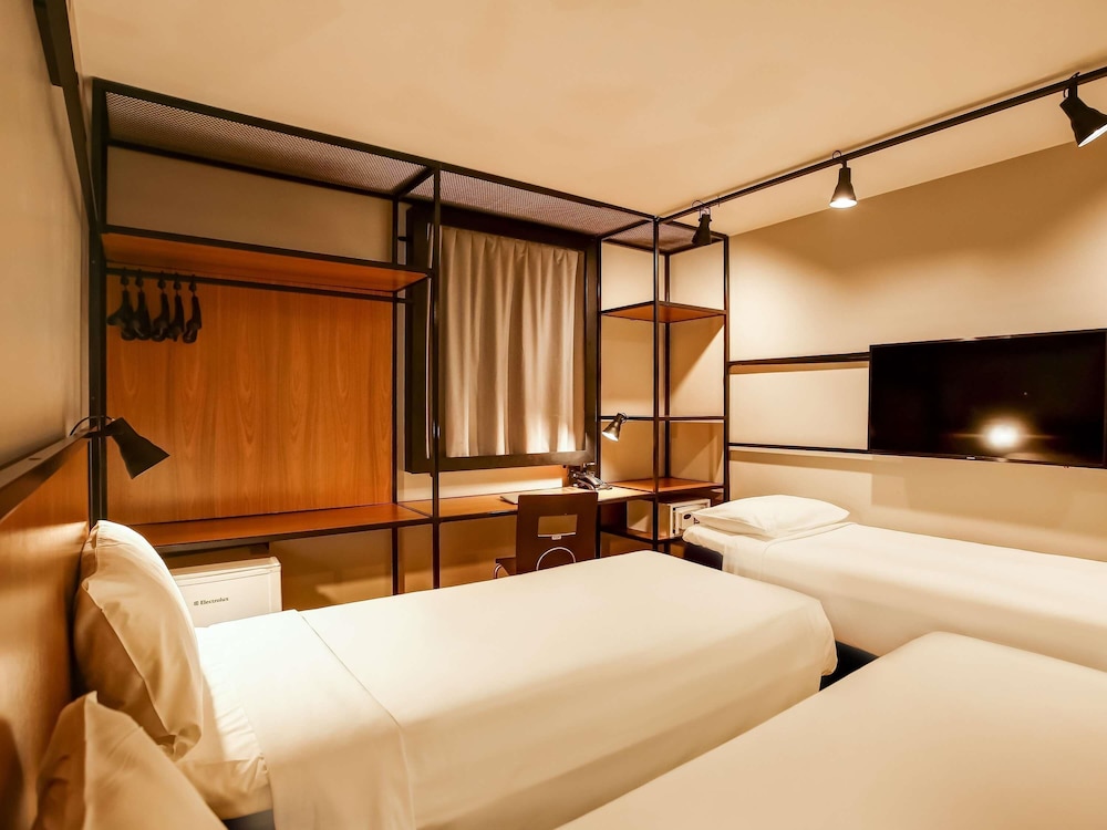 Apartamento Standard con 3 camas individuales del hotel Ibis Copacabana Posto 2. Foto 8
