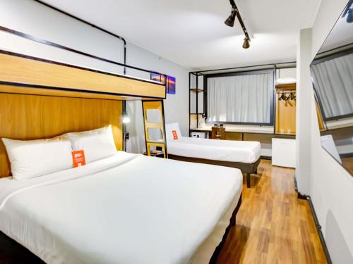 Habitación Standard con 1 cama individual y 1 litera del hotel Ibis Copacabana Posto 2. Foto 6