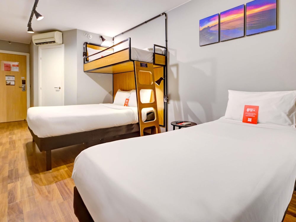 Habitacion Standard con 1 cama doble, 1 CAMA INDIVIDUAL Y 1 CAMA PLEGABLE del hotel Ibis Copacabana Posto 2. Foto 11