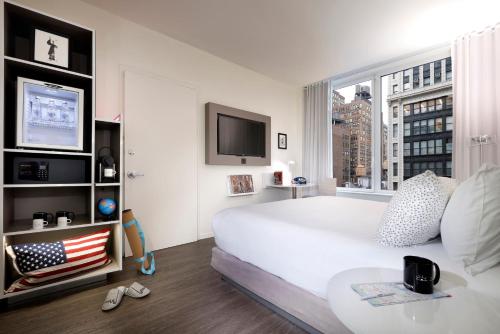 Habitación The INNSiDE con cama extragrande del hotel Innside New York NoMad