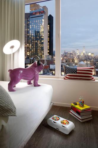 Loft The Family con vistas a la ciudad del hotel Innside New York NoMad. Foto 12