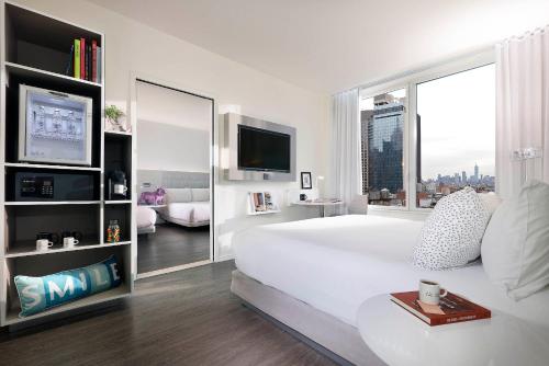 Loft The Family con vistas a la ciudad del hotel Innside New York NoMad. Foto 17