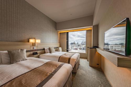 Habitación Doble Estándar en planta superior y para no fumadores - 2 camas del hotel KEIHAN TSUKIJI GINZA GRANDE