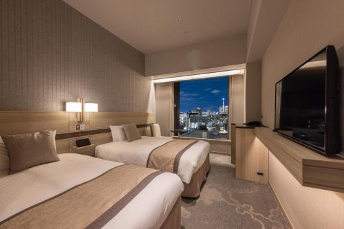 Habitación Doble Estándar en planta superior y para no fumadores - 2 camas del hotel KEIHAN TSUKIJI GINZA GRANDE. Foto 1