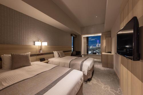 Habitación Doble Confort para no fumadores en planta superior - 2 camas del hotel KEIHAN TSUKIJI GINZA GRANDE. Foto 1
