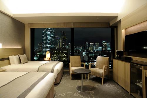 Habitación Doble Confort con vistas - 2 camas - Planta superior - No fumadores del hotel KEIHAN TSUKIJI GINZA GRANDE. Foto 1