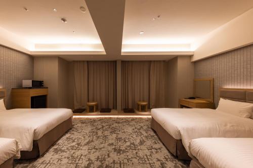 Habitación Deluxe cuádruple - No fumadores (4 camas) del hotel KEIHAN TSUKIJI GINZA GRANDE. Foto 5
