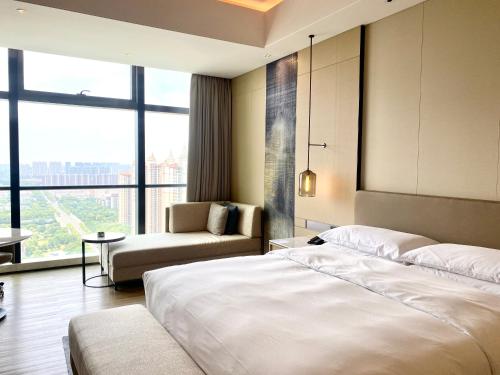 Habitación con vistas a la ciudad - Cama extragrande del hotel Zhangjiagang Marriott