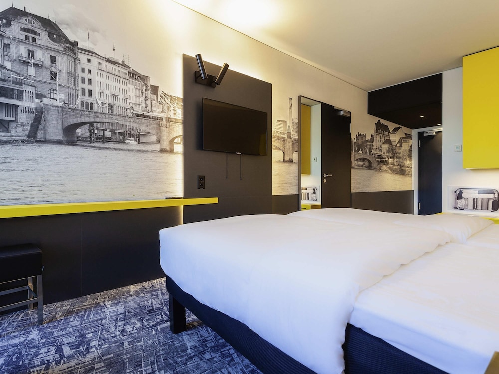 Habitación estándar con 1 cama queen - size (160 x 200 cm) del hotel Ibis Styles Basel City. Foto 5