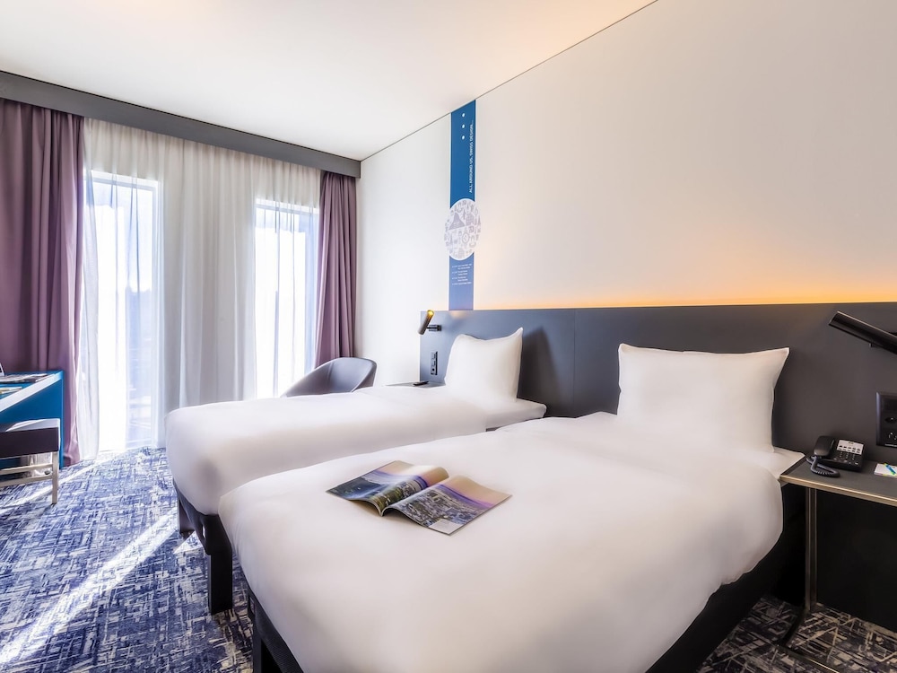 Habitación estándar con camas individuales (100 x 200 cm) del hotel Ibis Styles Basel City. Foto 7