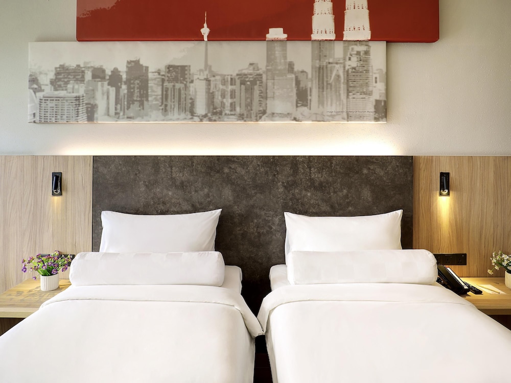 Habitación Estándar con 2 camas individuales, planta alta del hotel Ibis Kuala Lumpur City Centre
