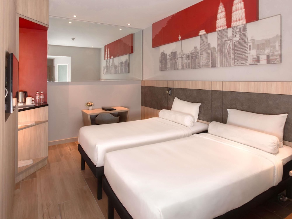 Habitación Estándar con 2 camas individuales sin ventana del hotel Ibis Kuala Lumpur City Centre