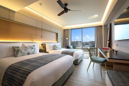 Habitación Doble Deluxe con vistas al mar del hotel Renaissance Cancun Resort and Marina. Foto 4