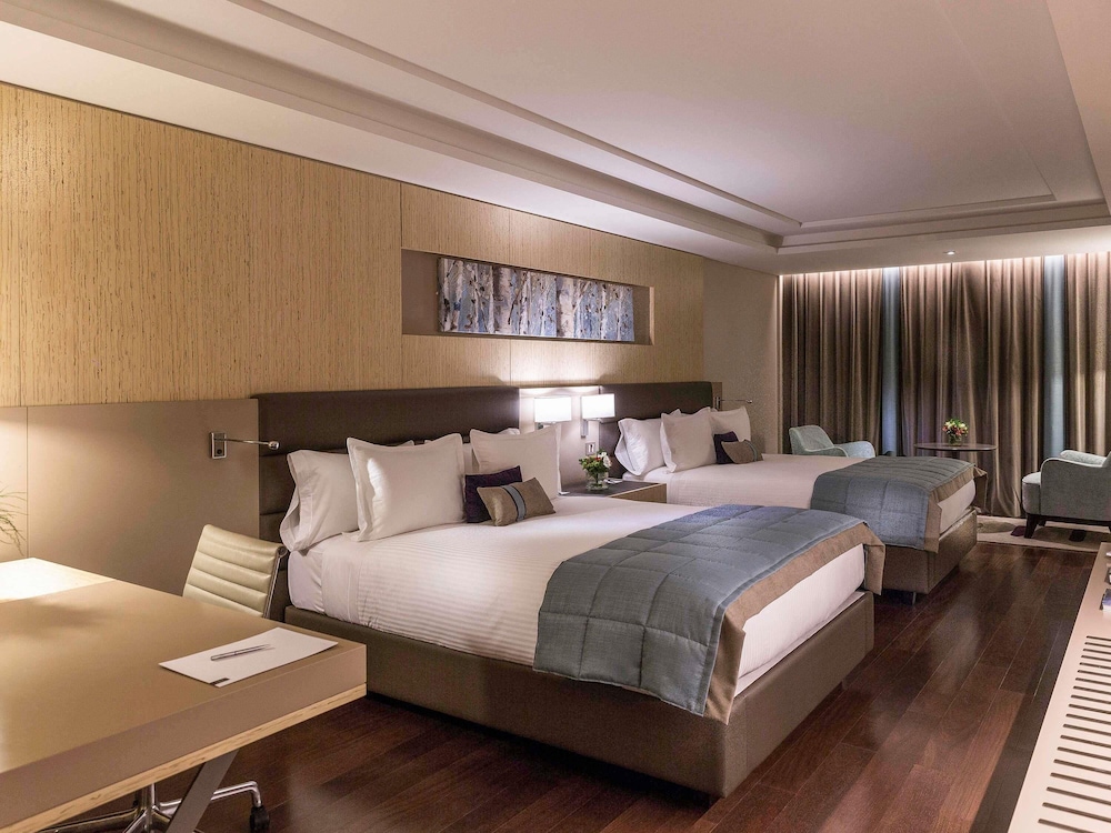 Habitación Executive con 2 camas queen size y balcón del hotel Palladio Buenos Aires MGallery. Foto 10