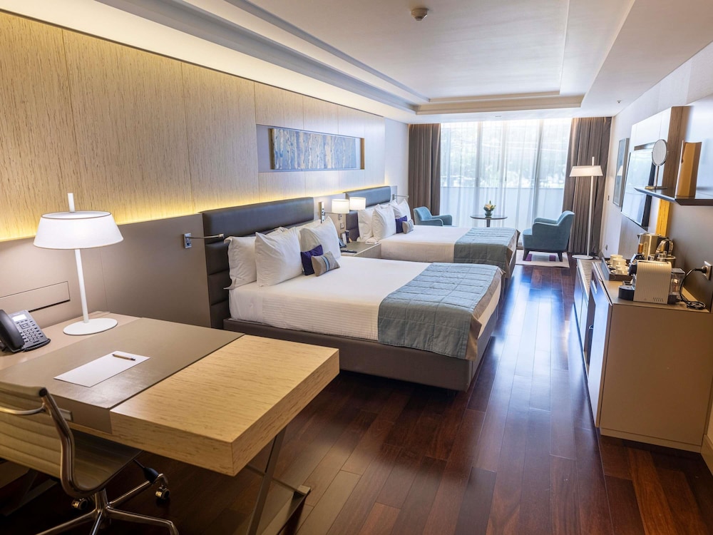 Suite Deluxe accesible con 2 camas queen size y vistas al parque del hotel Palladio Buenos Aires MGallery