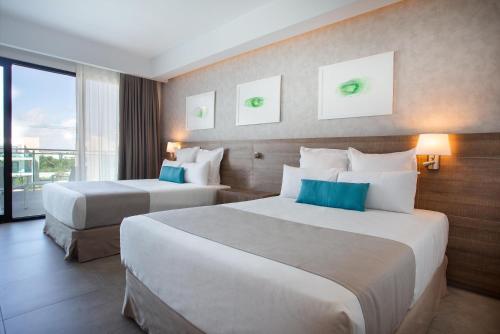 Luxury Tropical Garden View del hotel Serenade Punta Cana Beach & Spa Resort. Foto 1
