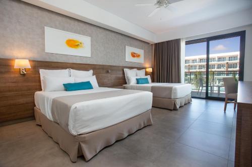 Luxury Tropical Garden View del hotel Serenade Punta Cana Beach & Spa Resort. Foto 3