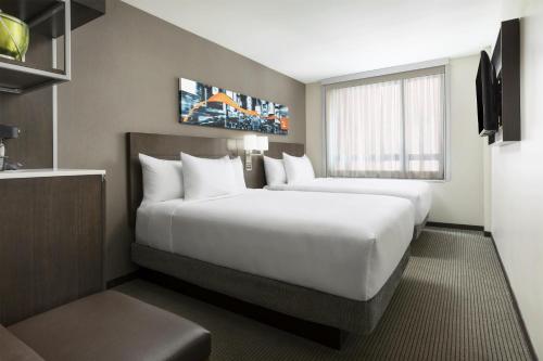 Habitación Doble - Planta superior - 2 camas dobles del hotel Hyatt Place New York City/Time Square. Foto 2