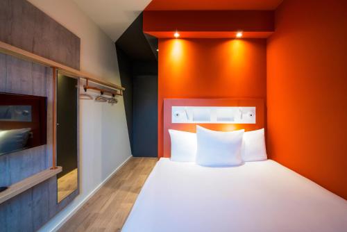 Habitación Triple del hotel Ibis Budget Rotterdam The Hague Airport. Foto 5