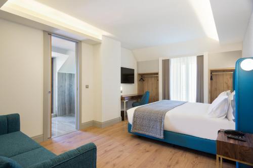 Habitación Doble con Cama supletoria del hotel Acta The Avenue. Foto 1