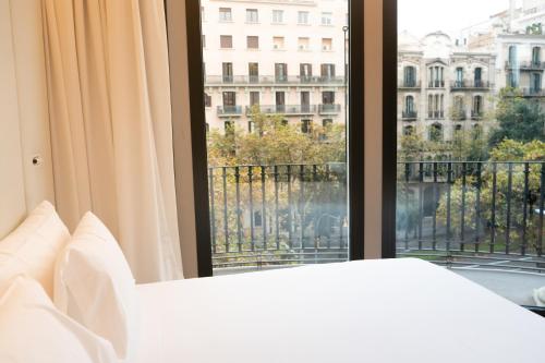 Habitación Doble Deluxe con terraza del hotel Occidental Diagonal 414. Foto 9