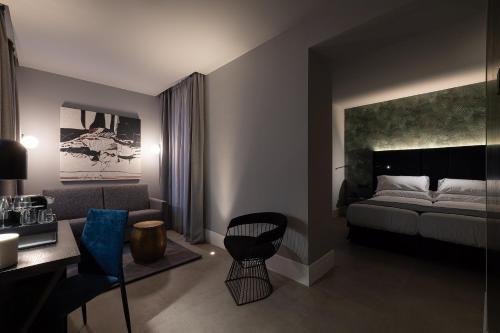 Habitación Triple del hotel Boutique Cordial Malteses