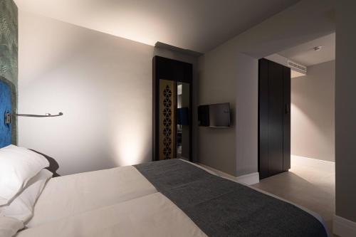 Habitación Triple del hotel Boutique Cordial Malteses. Foto 3