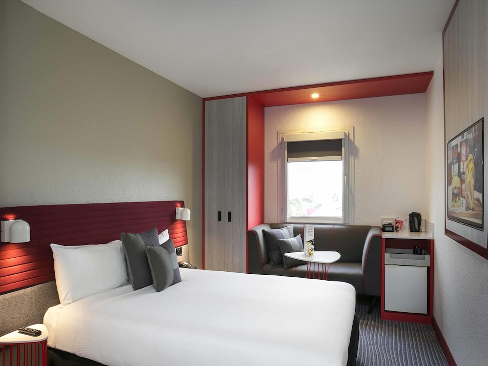Habitación superior, 1 cama de matrimonio grande del hotel Ibis Sydney Airport. Foto 5