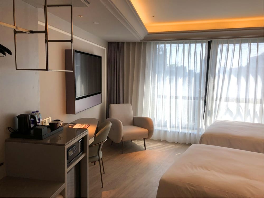 Habitación Deluxe, 2 camas individuales del hotel Mercure Hangzhou West Lake. Foto 1