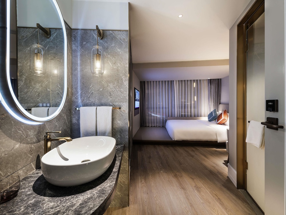 Habitación estándar, 1 cama de matrimonio grande del hotel Mercure Hangzhou West Lake. Foto 4