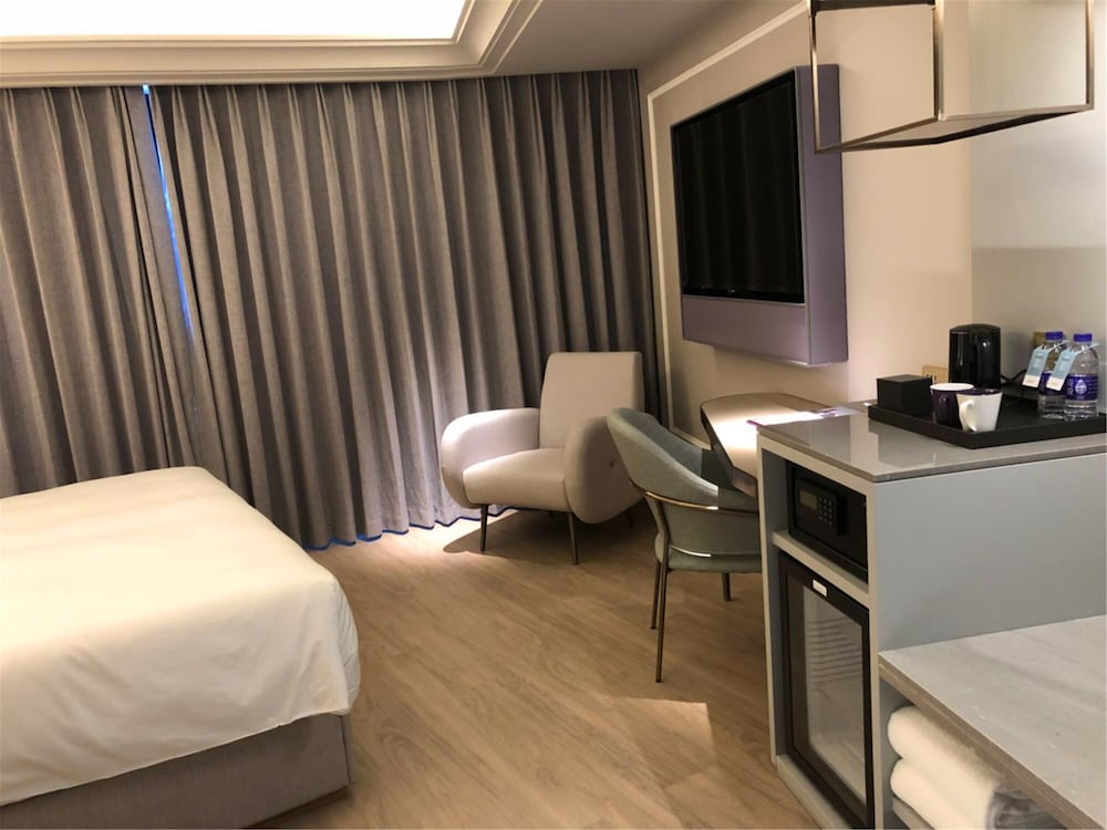 Habitación superior, 1 cama de matrimonio grande del hotel Mercure Hangzhou West Lake. Foto 3