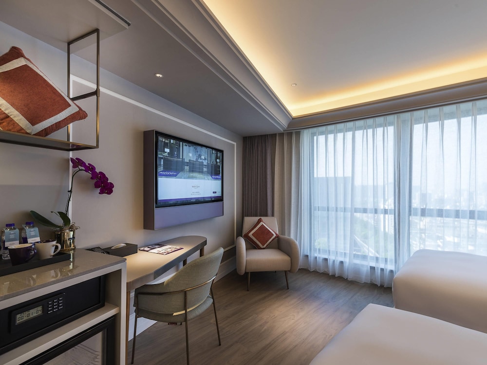 Habitación superior, 2 camas individuales del hotel Mercure Hangzhou West Lake. Foto 1