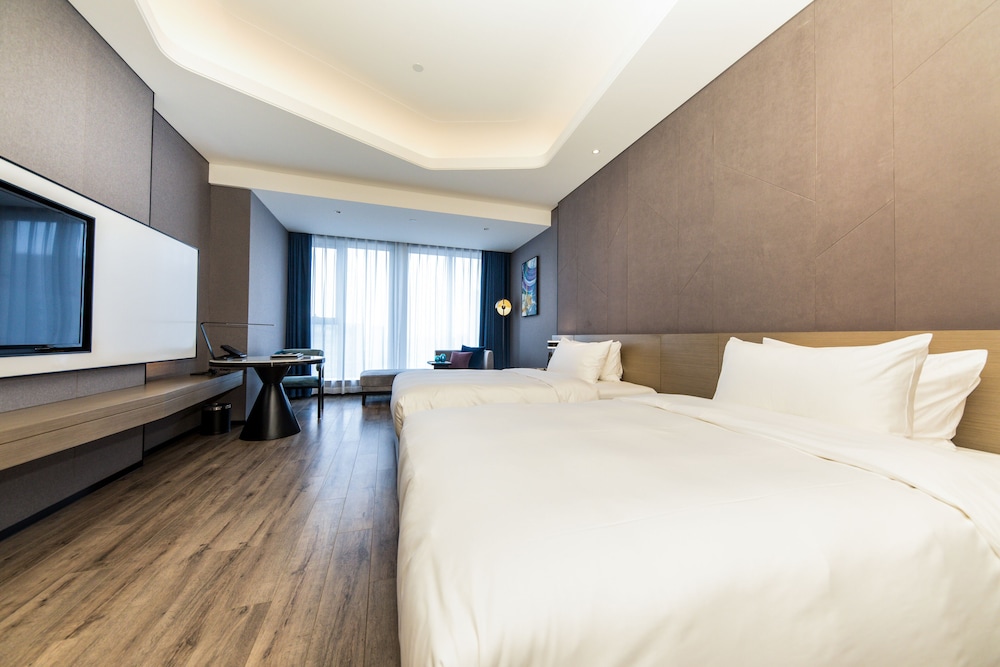 Habitación superior con 2 camas individuales del hotel Mercure Xian Hi Tech Zone. Foto 3