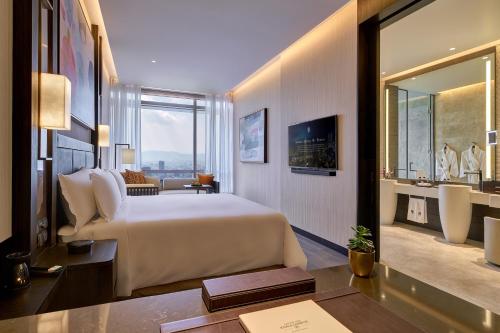 Retiro Banyan de diseño con cama extragrande del hotel Banyan Tree Kuala Lumpur