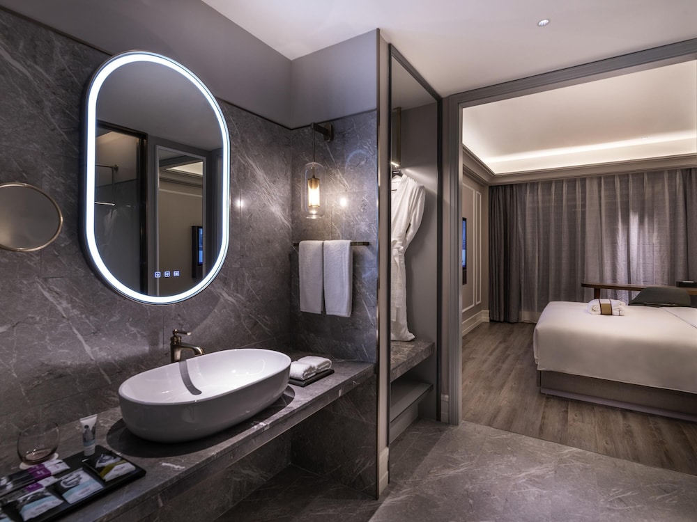 Habitación superior, 1 cama de matrimonio grande del hotel Mercure Suzhou Jinji Lake. Foto 2