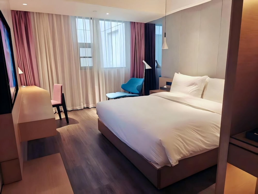 Habitación superior, 1 cama de matrimonio grande del hotel Mercure Suzhou Downtown. Foto 1